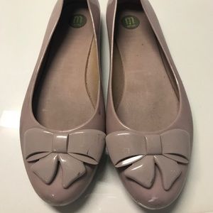 Melissa’s mauve jelly flats withcute embossed bow